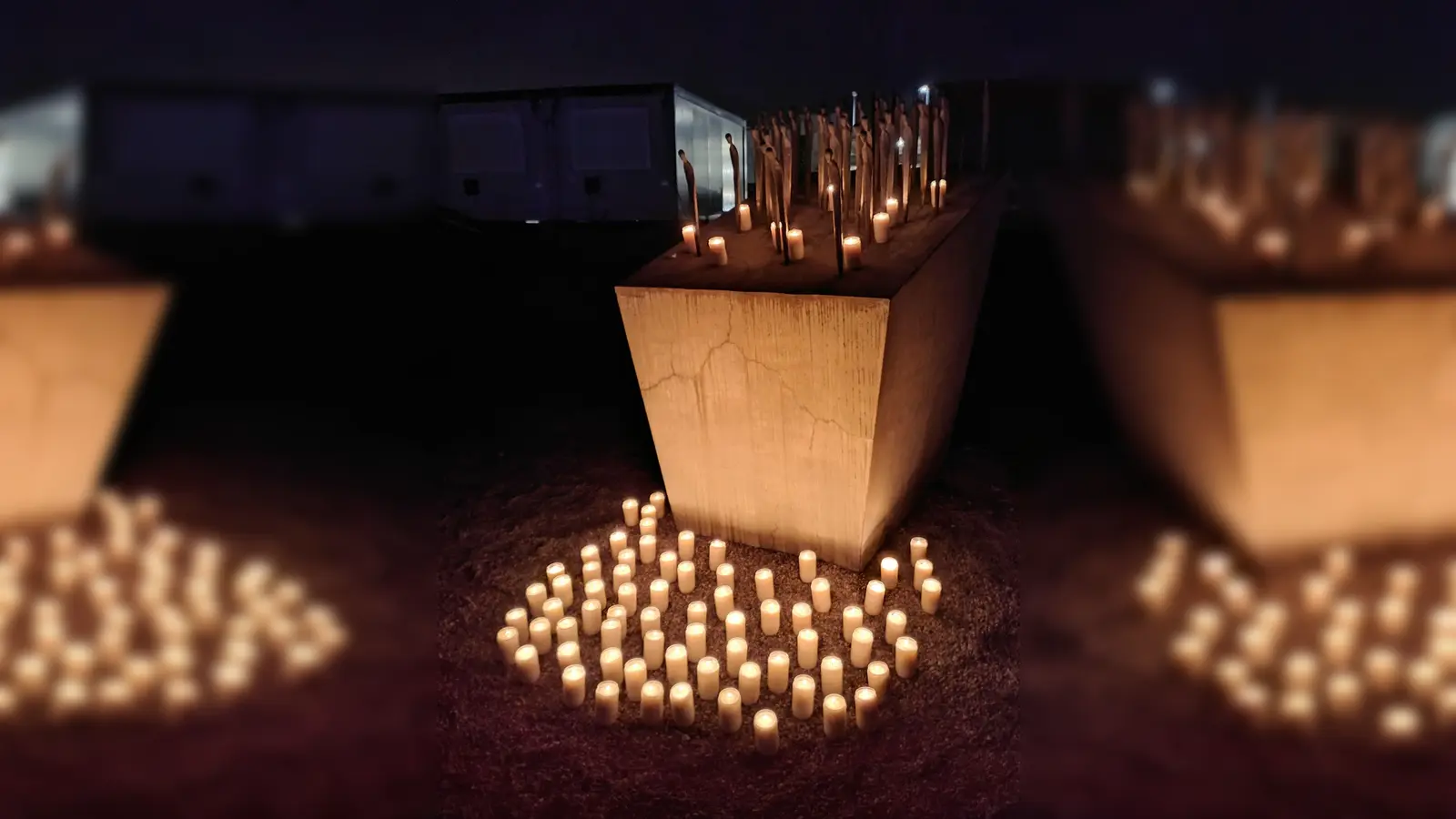Am Ende waren es sogar mehr als 77 Kerzen am Mahnmal, weil einige Besucher eigene Lichter mitgebracht hatten.  (Foto: Markus Brennhäußer)